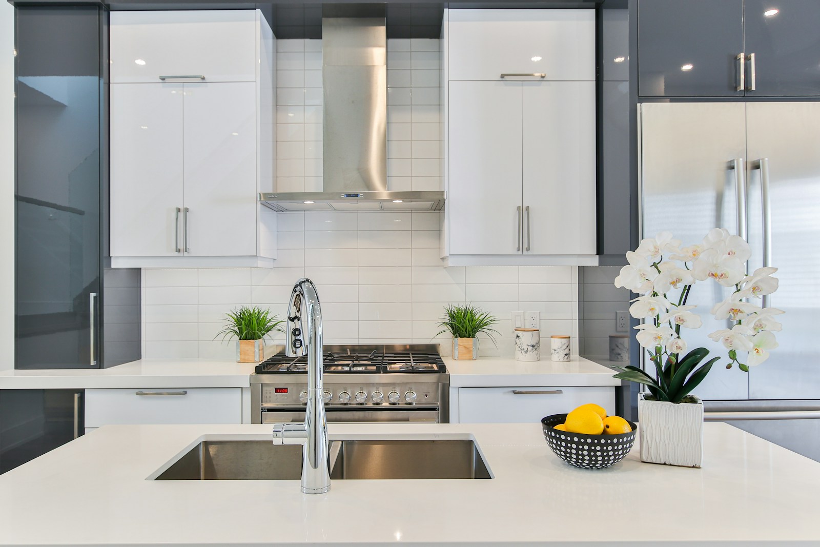 gray stainless steel faucet and beautiful kitchen countertops