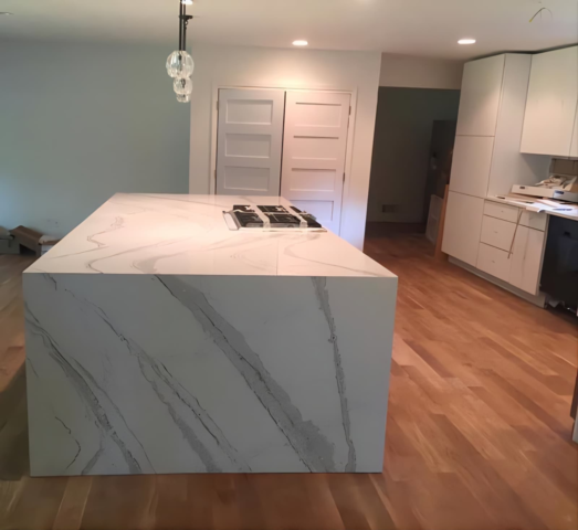 Quartz Kitchen Island installed by Atlanta Granite Pros beautiful kitchen island in Flowery Branch